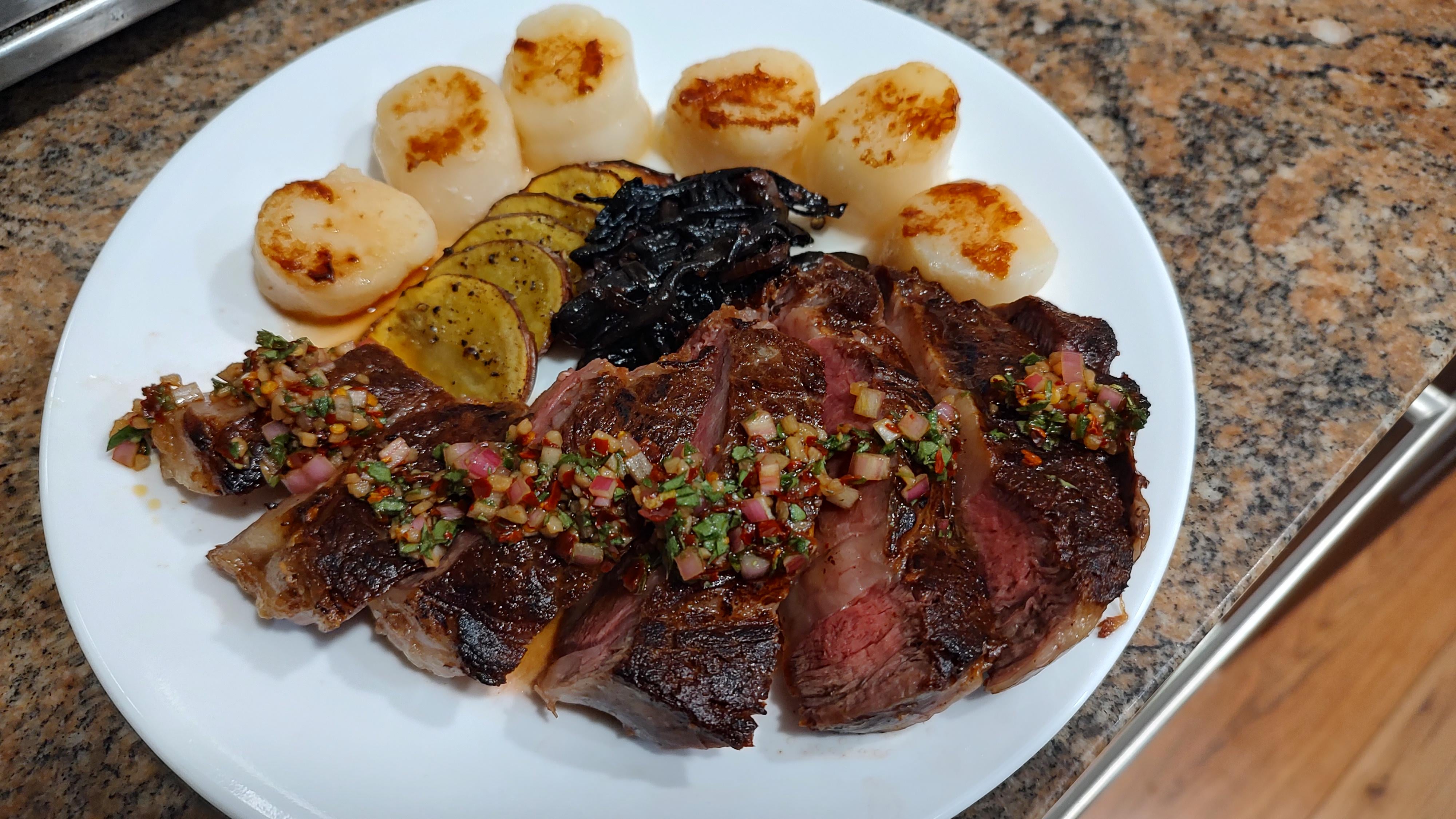 [Homemade] dry aged ribeye with seared scallops, roasted potato and
